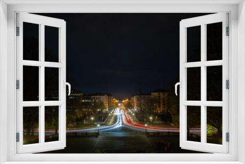 Fototapeta Naklejka Na Ścianę Okno 3D - Nighttime Urban Sprawl with Light Trails - Munich Skyline