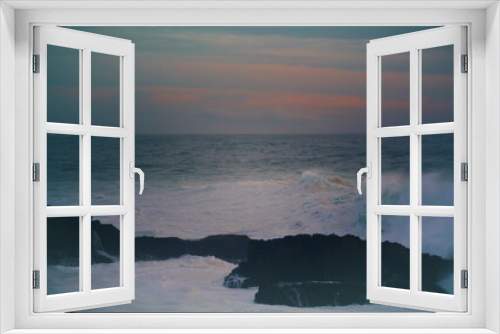 Fototapeta Naklejka Na Ścianę Okno 3D - Storm ocean hitting coastal rocks at dark skyline. Breathtaking evening seascape