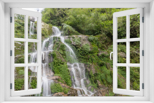 Fototapeta Naklejka Na Ścianę Okno 3D - Beautiful cascading Bakthang waterfall in the Himalayan valley in Sikkim, India