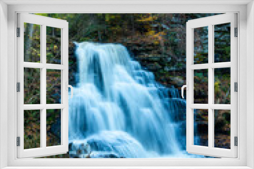 Fototapeta Naklejka Na Ścianę Okno 3D - Cascade of waterfalls in a mountain gorge, fast flowing water, long exposure