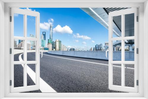 Fototapeta Naklejka Na Ścianę Okno 3D - Asphalt highway road and pedestrian bridge with modern city buildings scenery in Shanghai