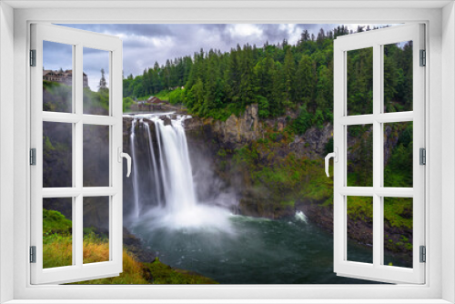 Fototapeta Naklejka Na Ścianę Okno 3D - Snoqualmie Falls with lush greenery and mist in Washington State, USA. Snoqualmie Falls is a 268-foot waterfall on the Snoqualmie River between Snoqualmie and Fall City. Long exposure.