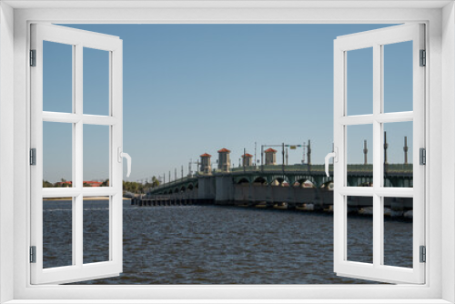 Fototapeta Naklejka Na Ścianę Okno 3D - The Bridge of Lions spans a river in Saint Augustine, Florida, on a clear winter day.