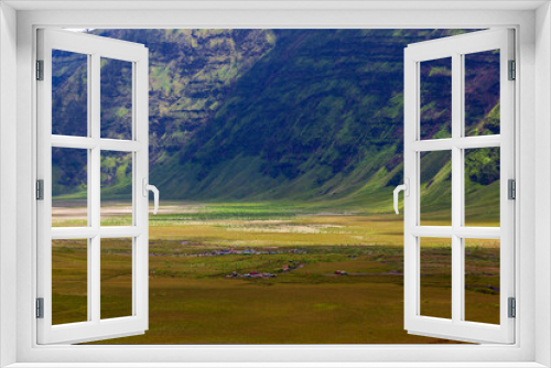 Fototapeta Naklejka Na Ścianę Okno 3D - Landscape of green hills in the mountains on a cloudy day. Location of Mount Bromo in Bromo Tengger Semeru National Park, East Java, Indonesia