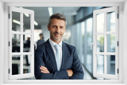 Happy confident american businessman in office looking at camera