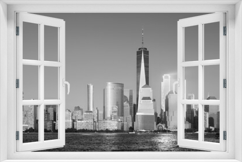 Fototapeta Naklejka Na Ścianę Okno 3D - Black and white photo of Manhattan skyline at sunset, New York City, USA.