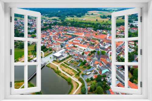 Fototapeta Naklejka Na Ścianę Okno 3D - Aerial view of the city Tirschenreuth in Germany on a cloudy day in late Spring