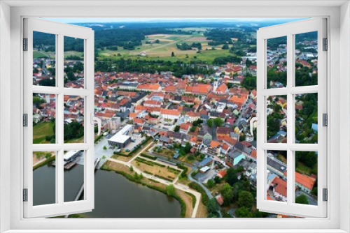 Fototapeta Naklejka Na Ścianę Okno 3D - Aerial view of the city Tirschenreuth in Germany on a cloudy day in late Spring