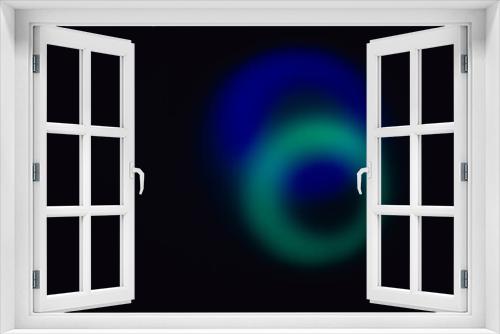 Fototapeta Naklejka Na Ścianę Okno 3D - Elliptical shape of bright blue and cyan blurry lights with dark holes on a black backdrop