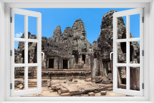 Fototapeta Naklejka Na Ścianę Okno 3D - The ancient ruins of a historic Khmer temple in the temple compl
