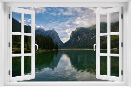 Fototapeta Naklejka Na Ścianę Okno 3D - Blick über einen See in Südtirol mit Bergpanorama im Hintergrund