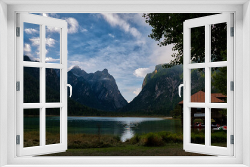 Fototapeta Naklejka Na Ścianę Okno 3D - Blick über einen See in Südtirol mit Bergpanorama im Hintergrund