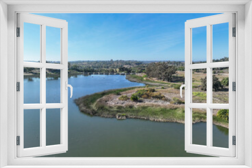 Fototapeta Naklejka Na Ścianę Okno 3D - Aerial view over water reservoir and a large dam that holds water. Rancho Santa Fe in San Diego, California, USA