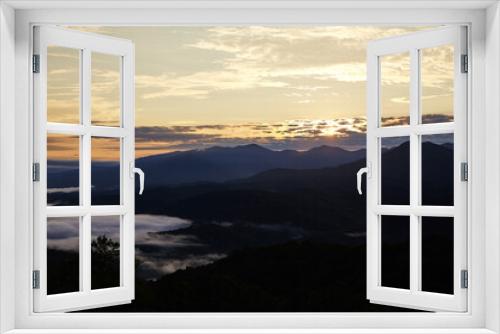 Fototapeta Naklejka Na Ścianę Okno 3D - Misty Sunrise Over Smoky Mountains, Golden Sky View