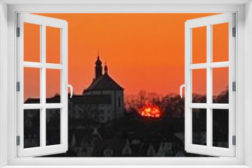 Fototapeta Naklejka Na Ścianę Okno 3D - orange sunset on Frauenberg in Fulda, Hesse, Germany