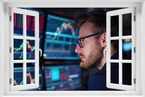 Close-up of a stock market trader monitoring multinational corporation stocks, screens showing international indices