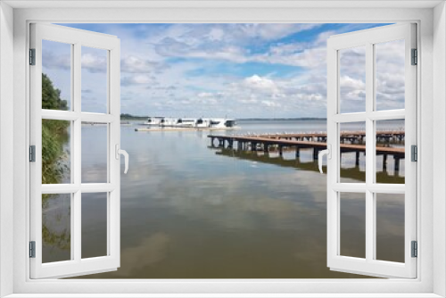 Fototapeta Naklejka Na Ścianę Okno 3D - Landscape of Jamno lake with pier and modern houseboats