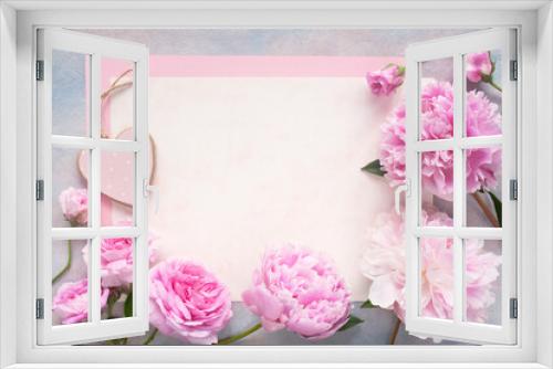 Fototapeta Naklejka Na Ścianę Okno 3D - Pink roses, peonies flowers, heart and paper for congratulations on a wooden background. Postcard, letter for the holiday.