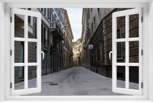 Fototapeta Naklejka Na Ścianę Okno 3D - Scorcio di una strada di Milano, Italia