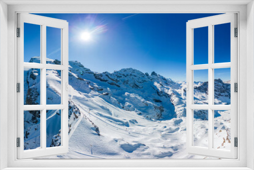 Fototapeta Naklejka Na Ścianę Okno 3D - Aerial panoramic winter landscape in Swiss Alps, famous Engelgerg - Titlis ski resort, Switzerland