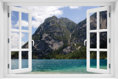 Fototapeta Naklejka Na Ścianę Okno 3D - Scenic Mountain Lake View with Clear Water and Green Trees. Nature Travel and Vacation Concept.