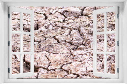 Fototapeta Naklejka Na Ścianę Okno 3D - Desert dry and cracked ground. Abstract texture background. Ponds or canals are dry and ground is cracked, natural phenomenon. surface, Dry soil in arid area.