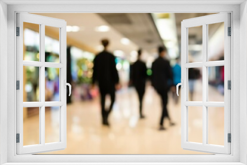 people walking in a mall, shoppers in a mall