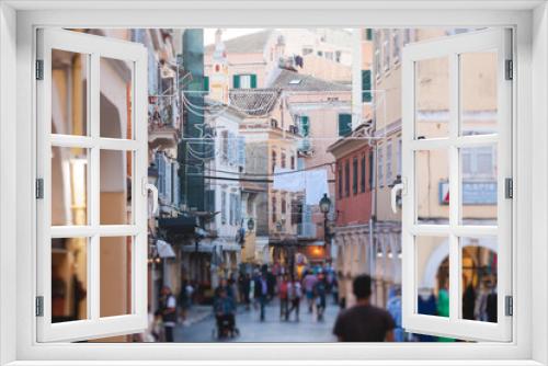 Fototapeta Naklejka Na Ścianę Okno 3D - Corfu street view, Kerkyra old town beautiful cityscape, Ionian sea Islands, Greece, a summer sunny day, pedestrian streets with shops and cafes, architecture of historic center, travel to Greece