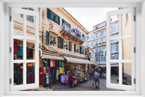 Fototapeta Naklejka Na Ścianę Okno 3D - Corfu street view, Kerkyra old town beautiful cityscape, Ionian sea Islands, Greece, a summer sunny day, pedestrian streets with shops and cafes, architecture of historic center, travel to Greece