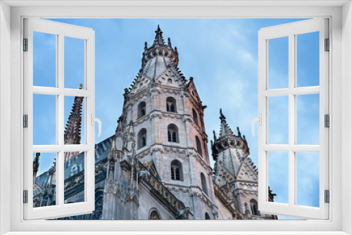 The facade of the St. Stephen's Cathedral in Vienna at the sunse