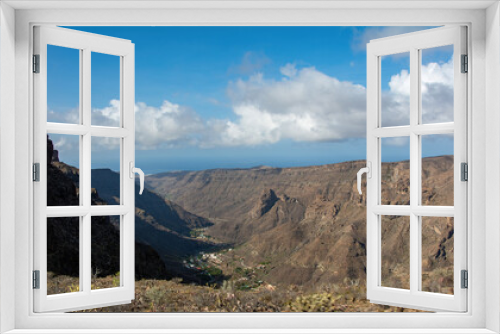 Fototapeta Naklejka Na Ścianę Okno 3D - Mountains and blue sky with clouds