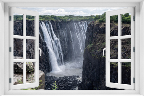 Fototapeta Naklejka Na Ścianę Okno 3D - beautiful landscape with Victoria Falls against the sky in Zimbabwe
