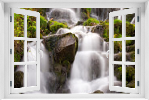Fototapeta Naklejka Na Ścianę Okno 3D - Waterfall and green overgrown (long exposure)