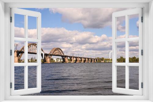 Fototapeta Naklejka Na Ścianę Okno 3D - a bridge over the Dnieper River in the city of Dnipro, Ukraine.