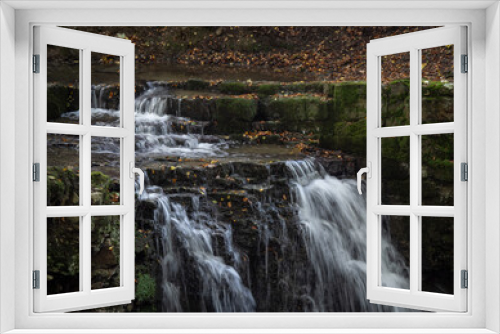 Fototapeta Naklejka Na Ścianę Okno 3D - The waterfall in green forest.