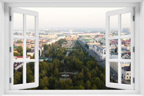Fototapeta Naklejka Na Ścianę Okno 3D - Kazan, Russia - August 6, 2020: Aerial view of Kazan city center in the early morning. City Park Black Lake, Kremlin, Aerial View