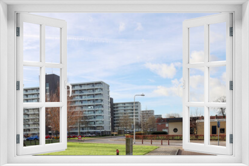 Fototapeta Naklejka Na Ścianę Okno 3D - Bomenwijk flats in Nieuwerkerk aan den IJssel
