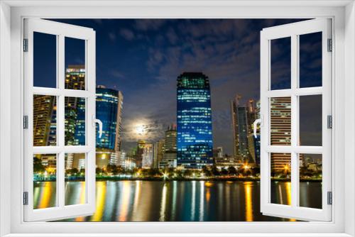 Fototapeta Naklejka Na Ścianę Okno 3D - Bangkok city downtown at night with reflection of skyline, Bangk