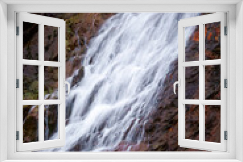 Fototapeta Naklejka Na Ścianę Okno 3D - Scenic waterfall in slow motion flow
