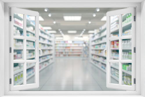 Blurry image of pharmacy shelves stocked with various medical products
