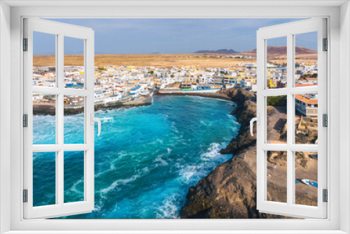 Fototapeta Naklejka Na Ścianę Okno 3D - Aerial top view of the beautiful fishing village El Cotillo - La Oliva, in the summertime on the Atlantic Coast in Fuerteventura island in Spain
