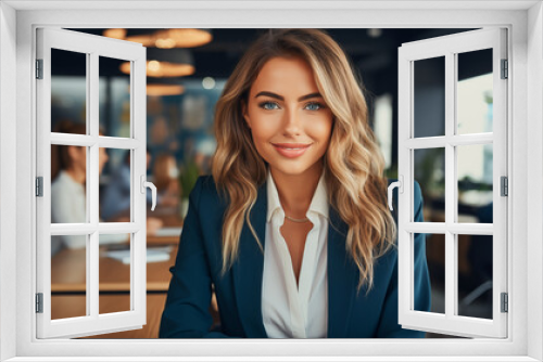 Portrait of a successful business lady in the office with her arms crossed. Concept of a happy, successful woman