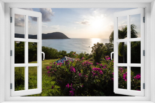 Fototapeta Naklejka Na Ścianę Okno 3D - Guadeloupe, a Caribbean island in the French Antilles. Landscape and view of the Grande Anse bay on Basse-Terre. A secluded bay, lots of nature and mangroves, at sunrise.