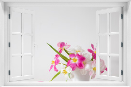 Fototapeta Naklejka Na Ścianę Okno 3D - white and pink  tulips in white vase on background wall