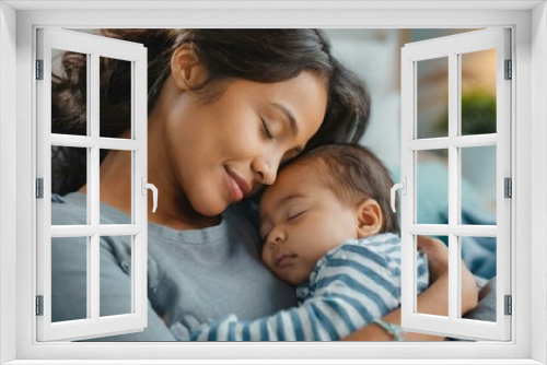 Tender bond Bright image of a mother's love with her peacefully sleeping infant at home bed