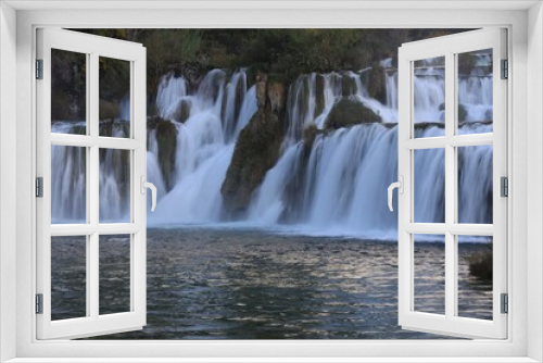 Fototapeta Naklejka Na Ścianę Okno 3D - Picturesque view of beautiful waterfall and rocks outdoors