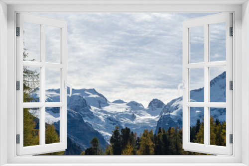 Fototapeta Naklejka Na Ścianę Okno 3D - Morteratsch, Switzerland - October 15th 2023: Panoramic view towards the highest Bernina mountains