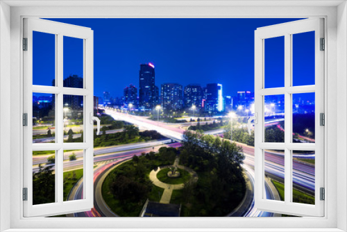 Fototapeta Naklejka Na Ścianę Okno 3D - traffic trails and modern cityscape of beijing,china