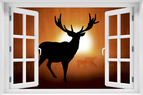 Fototapeta Naklejka Na Ścianę Okno 3D - Silhouette of a deer in sunset