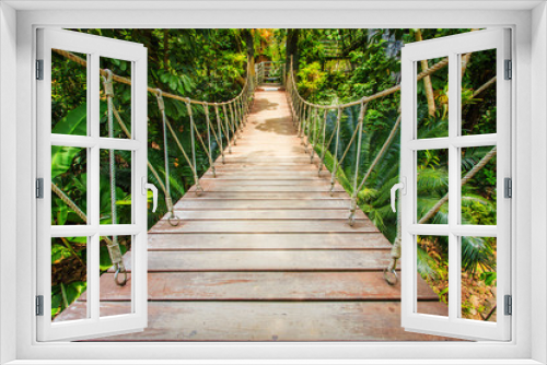 Fototapeta Naklejka Na Ścianę Okno 3D - Wood bridge in the garden, Thailand